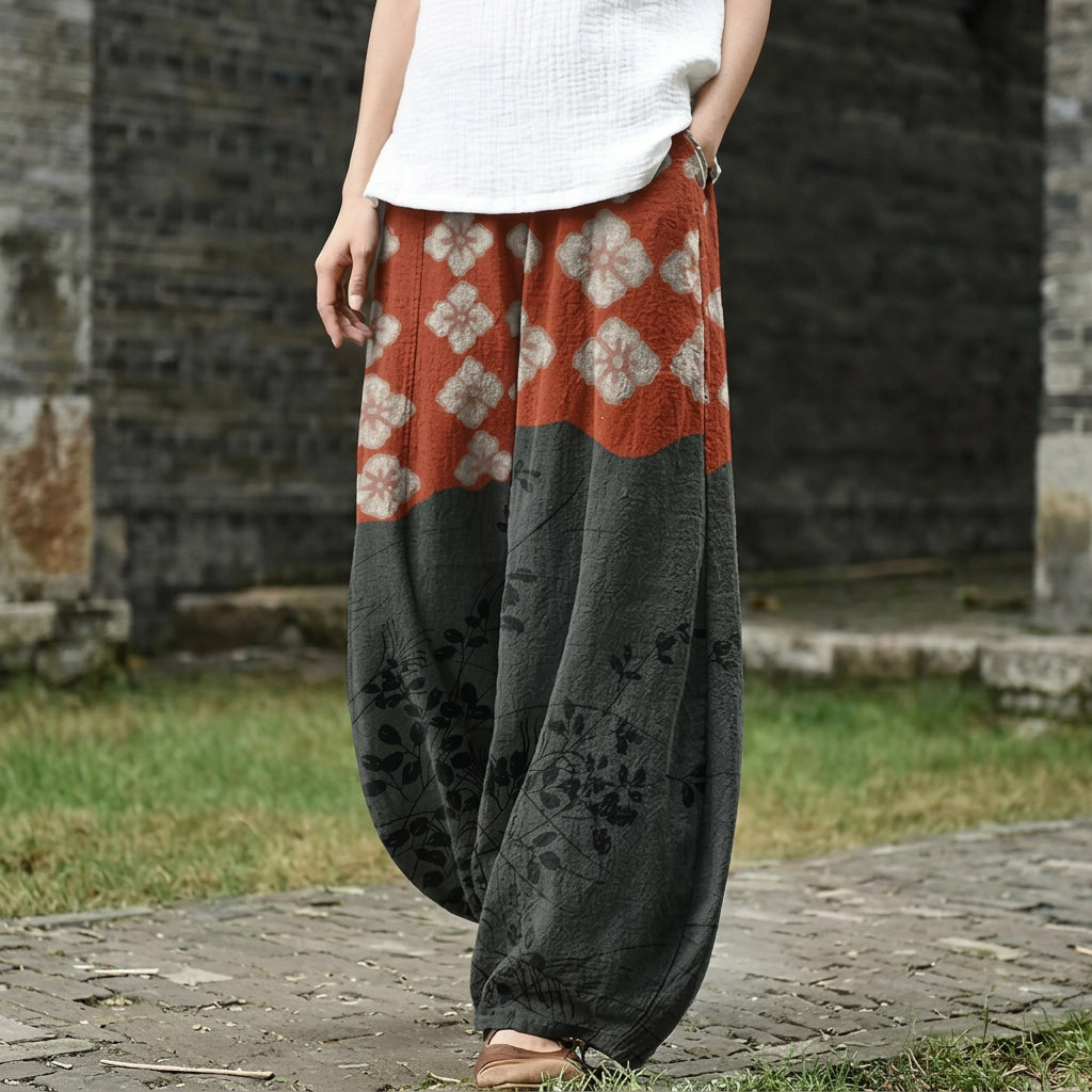 Florencja – Pantalón ancho con estampado floral naranja
