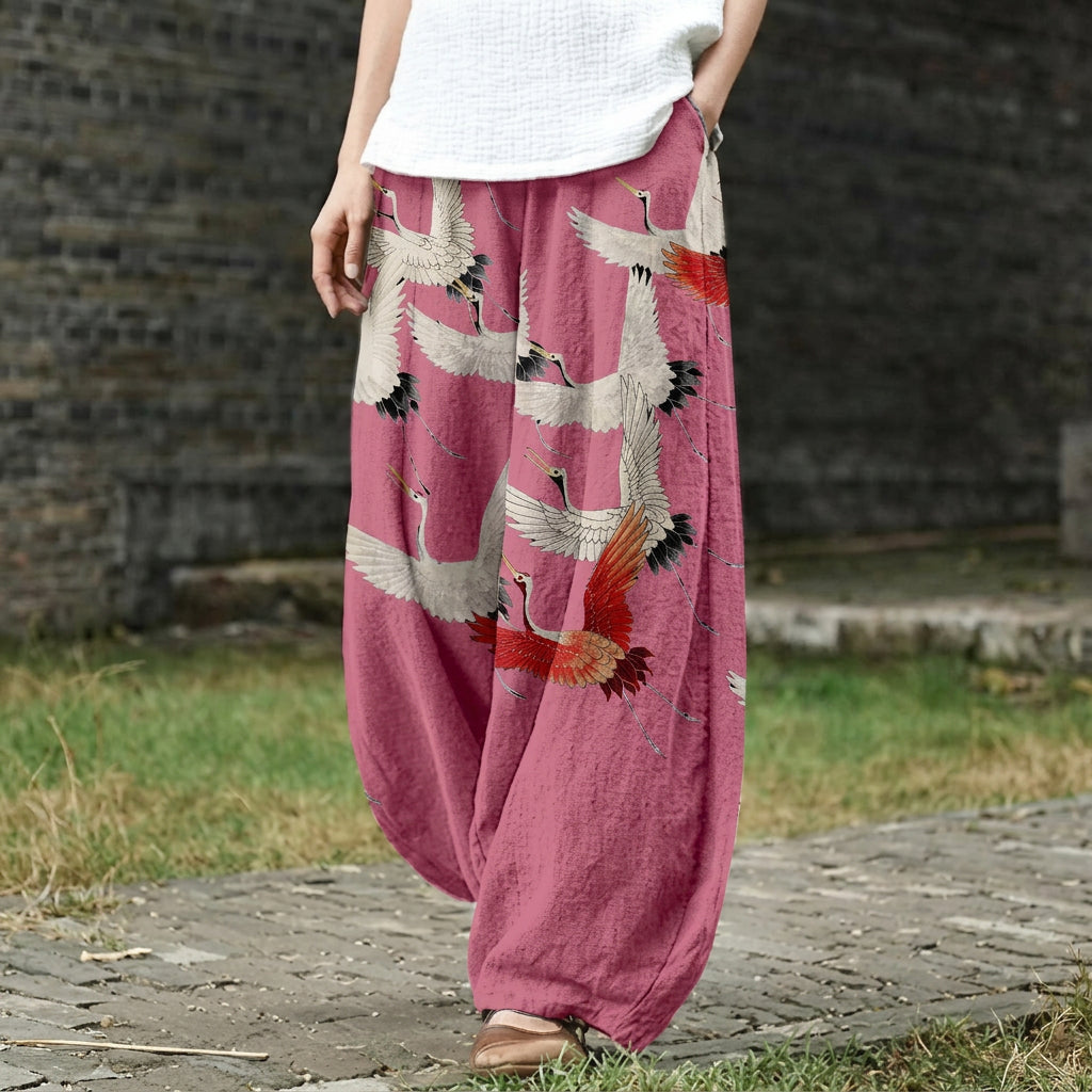 Noémie – Pantalón ancho rosa con estampado de grullas