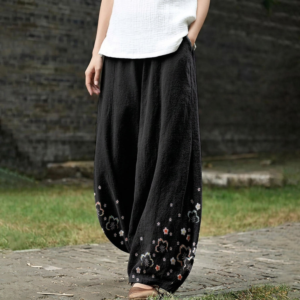 Armelle – Pantalón ancho negro con estampado floral