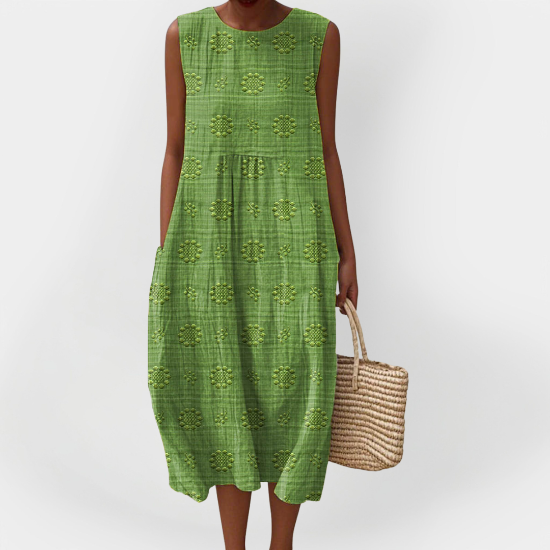Elegante vestido de algodón sin mangas y con bolsillos