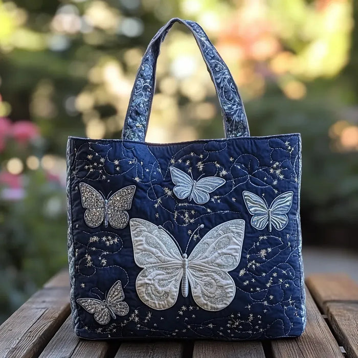 Bolso mariposa plateado hecho a mano