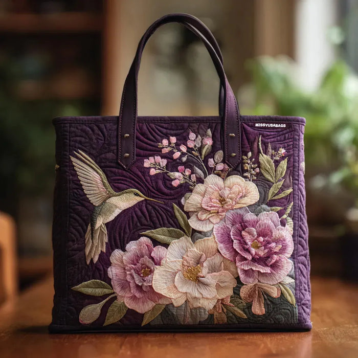 Bolso acolchado morado con motivo de colibrí y orquídea