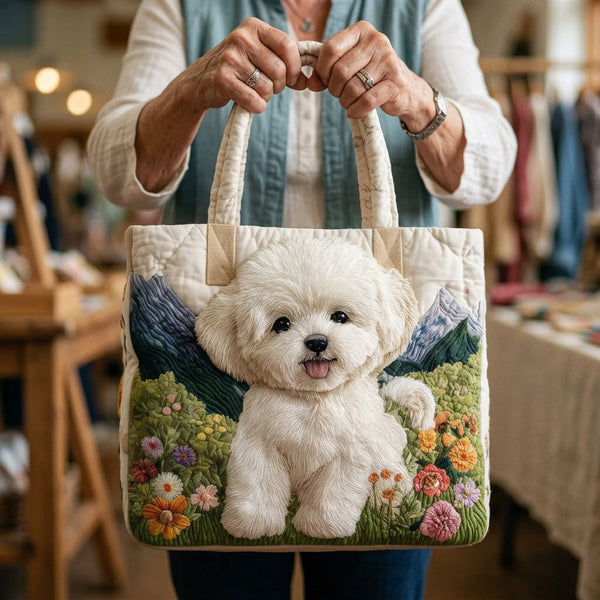 Elegante bolso bandolera confeccionado en tejido acolchado