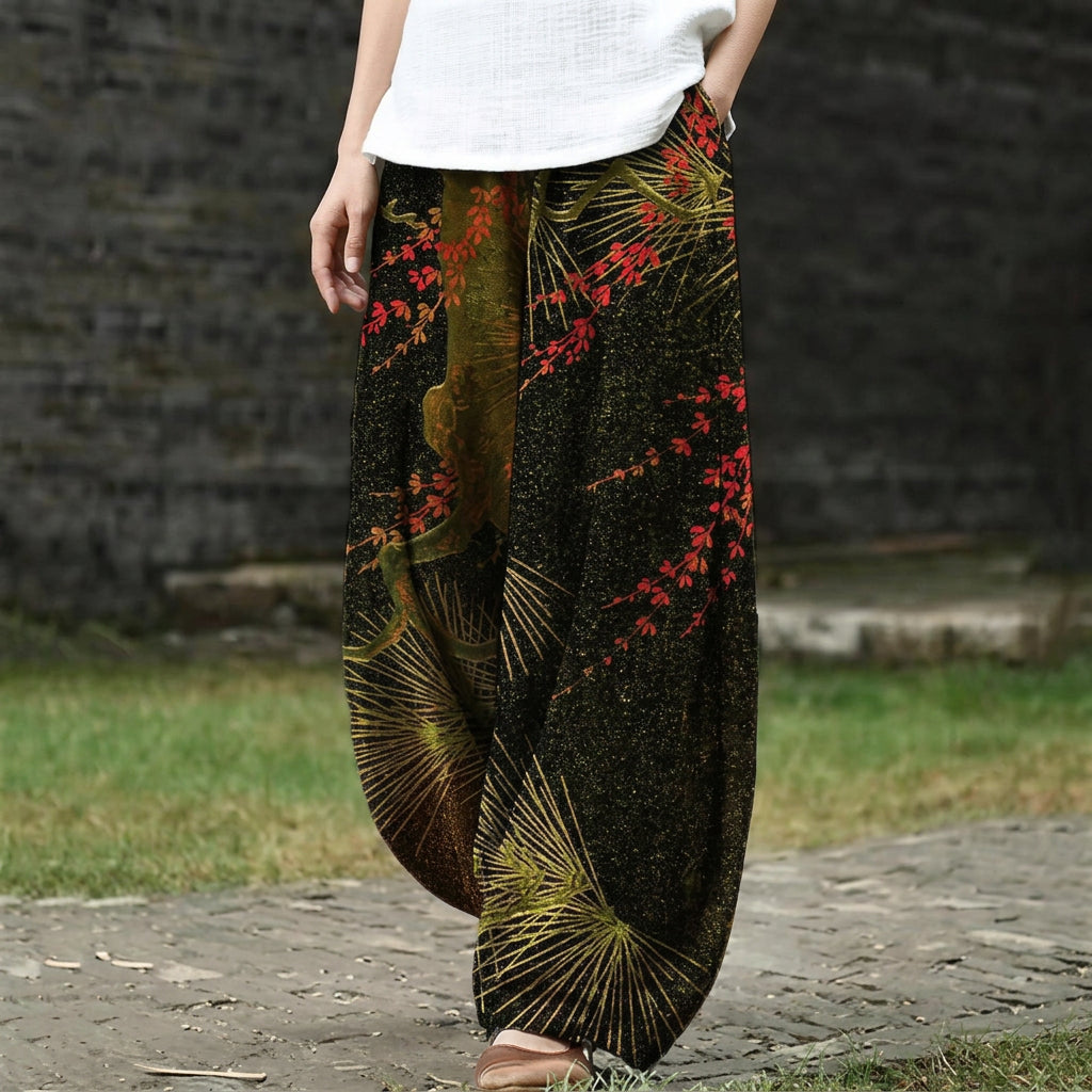 Camille – Pantalón ancho en verde oscuro con estampado botánico