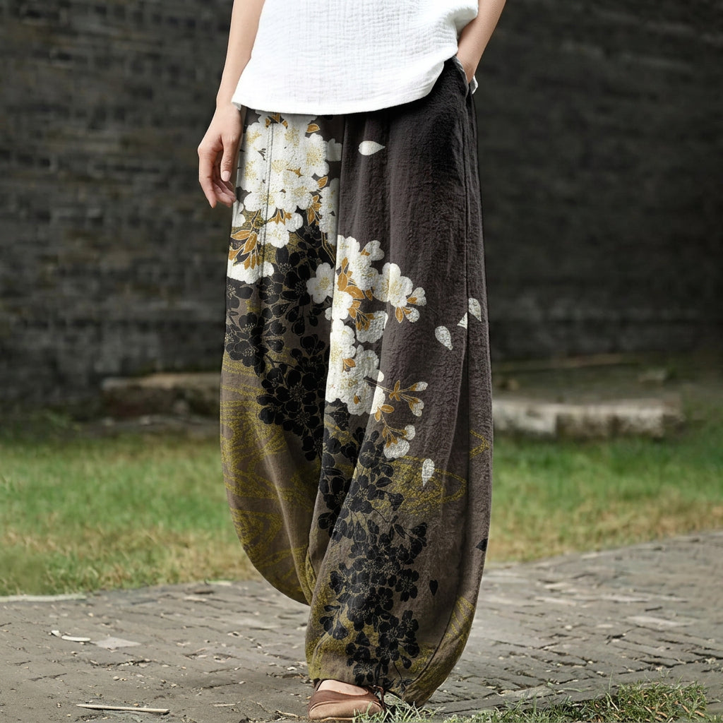 Delphine – Pantalón ancho blanco con estampado floral