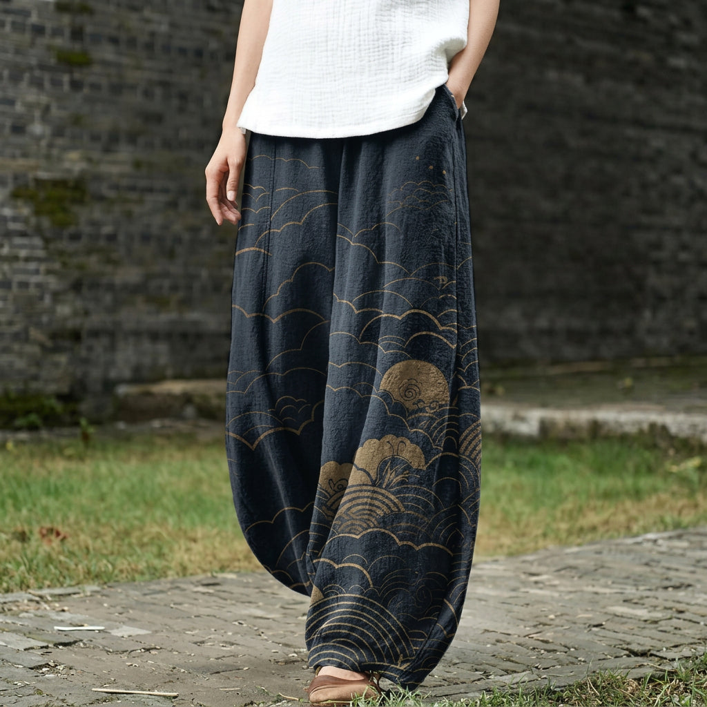 Capuchino - Pantalón ancho azul oscuro con estampado de sol