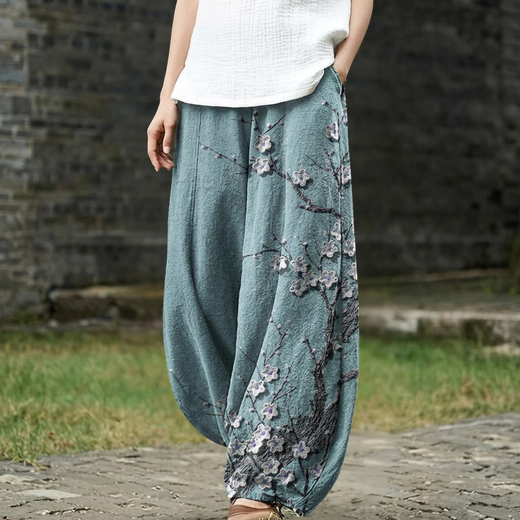 Carine – Pantalón ancho con estampado de hojas en azul