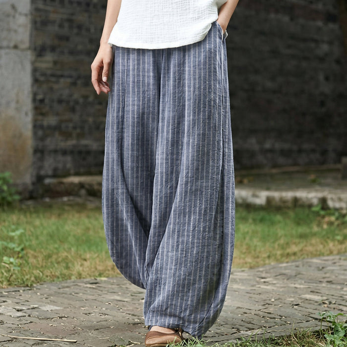Anne-Marie – Pantalón gris slim de rayas